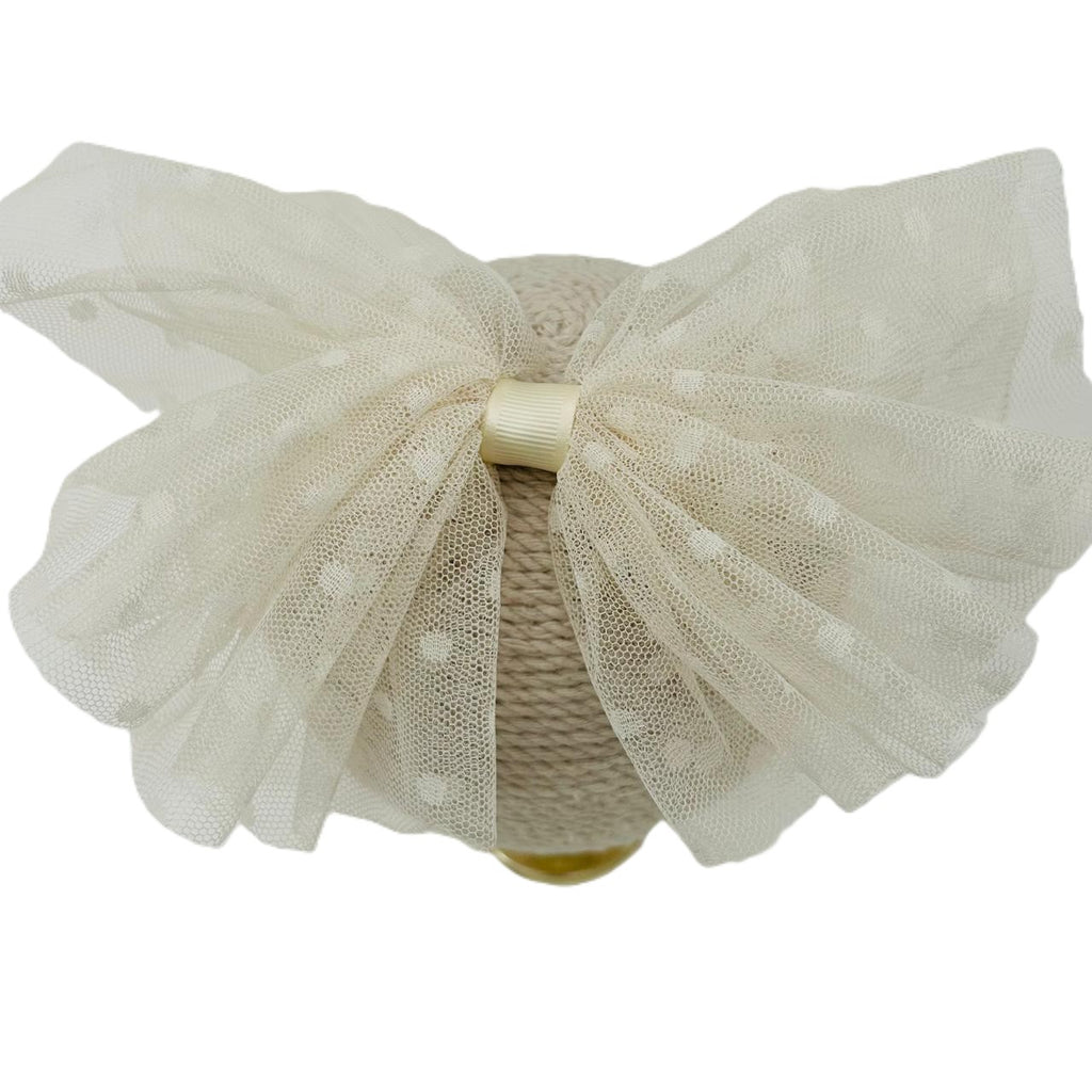 Moño broche de tul punteado