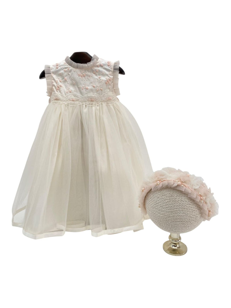 Batita sin manga florecitas bordadas